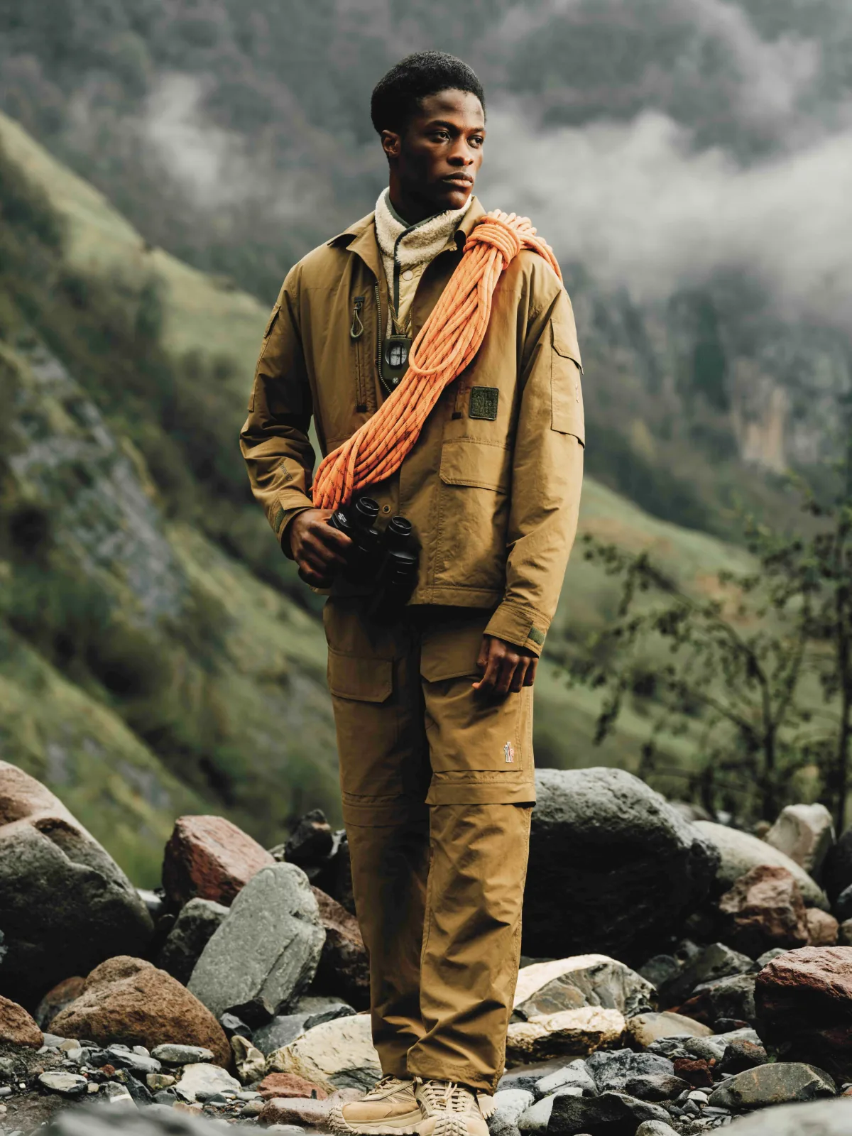 Fashion still from RESH Moncler Grenoble campaign — wide frame with model in jacket