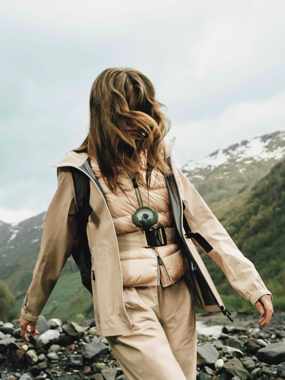 Fashion still from RESH Moncler Grenoble campaign — wide frame with model in jacket